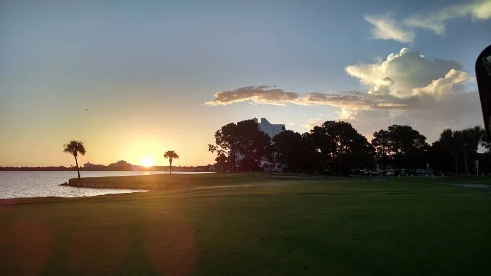 Sunset over a bayside green at The Links Golf Club at Sandestin.