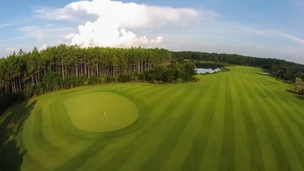 Aerial view of a green and fairway at Origins Golf Course
