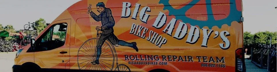 Big Daddy's Bike Shop branded rolling repair team van.