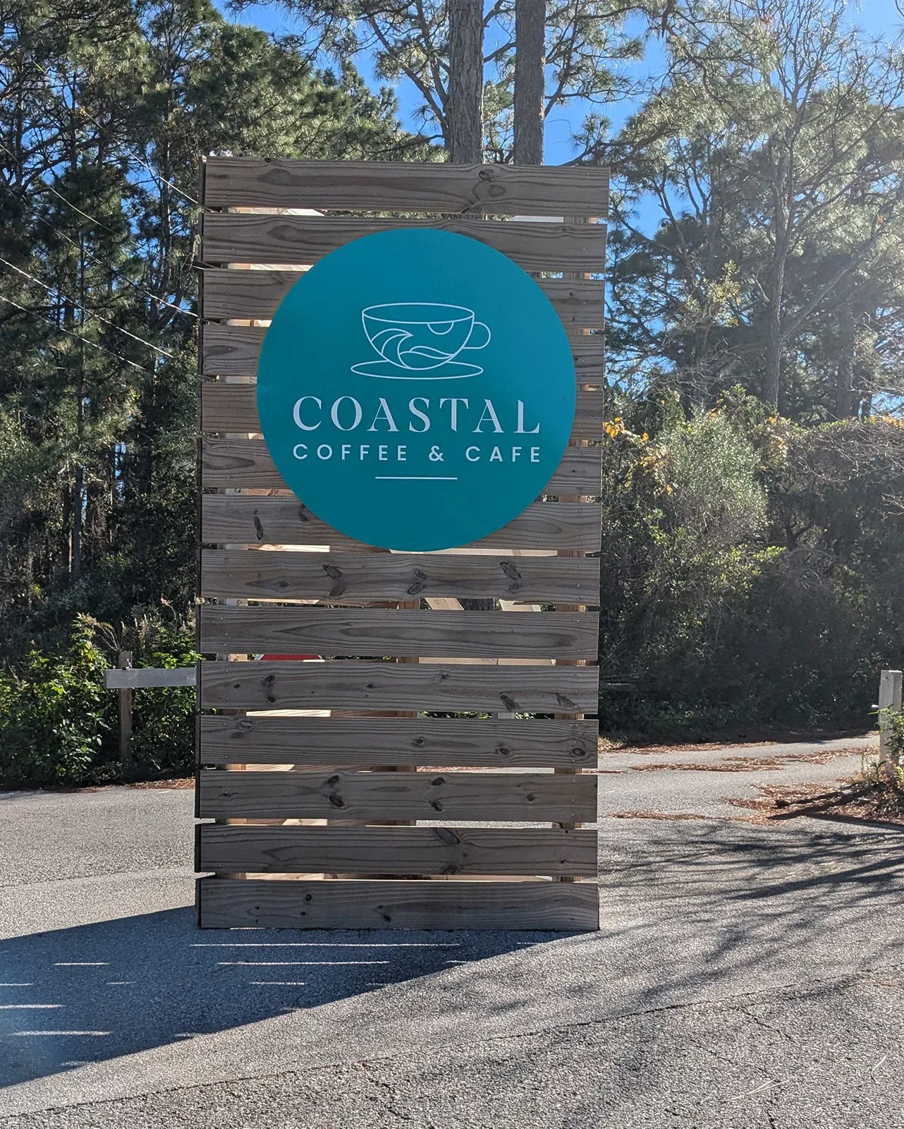 Coastal Coffee & Cafe sign at Topsail Hill Preserve State Park.