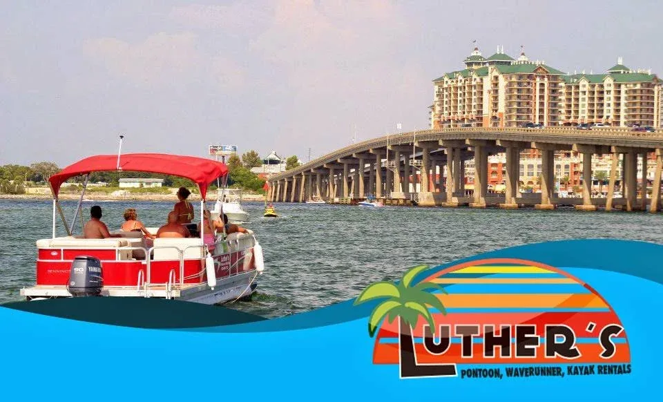 Luther's pontoon boat cruising near the Destin bridge